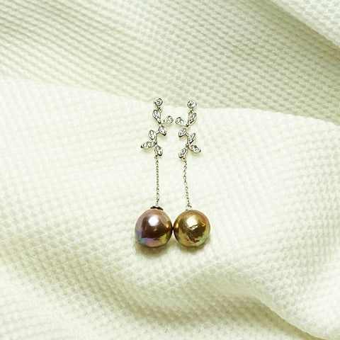 Charlotte Fresh Waster Pearl Drop Earrings | Earrings | 925 sterling silver, cultured pearl earrings, cultured pearls, dangle earrings, drop earrings, earrings, Fine Jewelry, fresh water pearl earring, fresh water pearls, intricate design earring, leave design drop earrings, long drop earrings, metallic pearl, metallic pearl earrings, new arrivals, pearl earrings, S925 earrings, silvery pearls, sterling silver earring, unique pearl | Dikuza