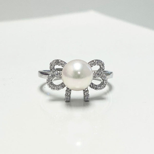 Aiden Akoya Pearl Bow Ring | Rings | adjustable ring, akoya pearl, Akoya white pearl bow ring, blue stone ring, cultured pearls, Fine Jewelry, flower zircon ring, Japanese Akoya pearl ring, new arrivals, rings, silvery pearls, unique pearl, white pearls | Dikuza