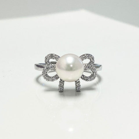 Aiden Akoya Pearl Bow Ring | Rings | adjustable ring, akoya pearl, Akoya white pearl bow ring, blue stone ring, cultured pearls, Fine Jewelry, flower zircon ring, Japanese Akoya pearl ring, new arrivals, rings, silvery pearls, unique pearl, white pearls | Dikuza