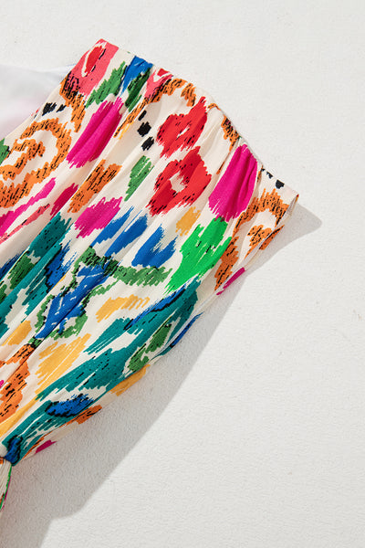 Vibrant Ikat Smocked Mini Dress