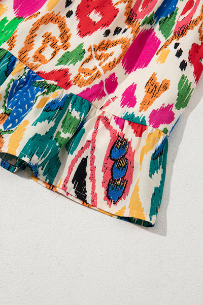 Vibrant Ikat Smocked Mini Dress