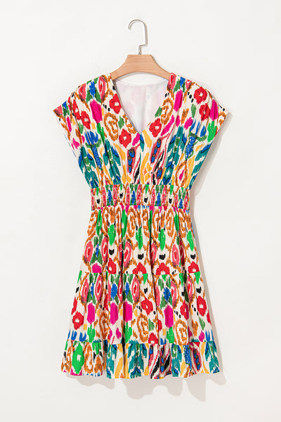 Vibrant Ikat Smocked Mini Dress